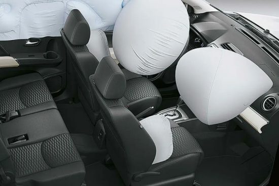 Interior view of the 2023 Toyota Rush showcasing the airbag system and safety features within the cabin.